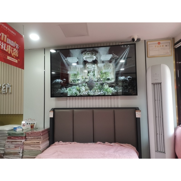 合肥高刘家纺店采购我司一台75寸壁挂广告机